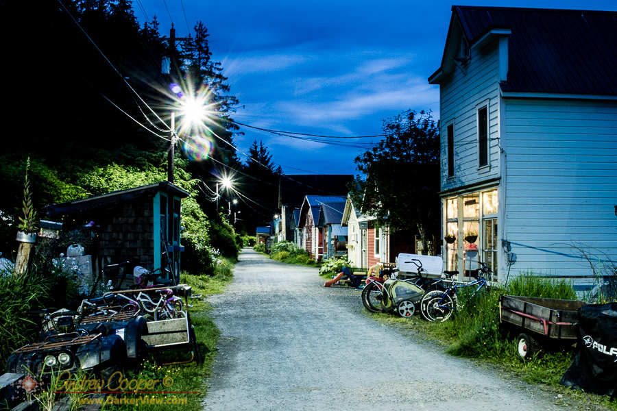 The main street of Tenakee during a twilght June night